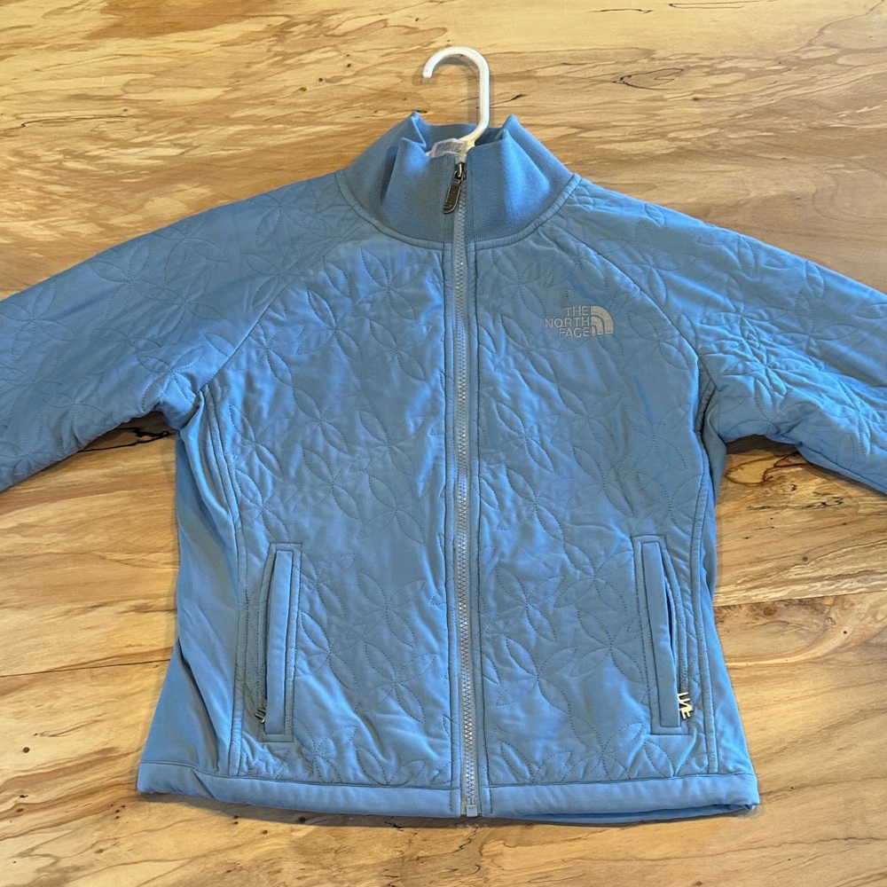 The North Face cropped quilted light Blue down warm running Jacket